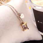 Hiekkalasin sydänriipus kaulakoru