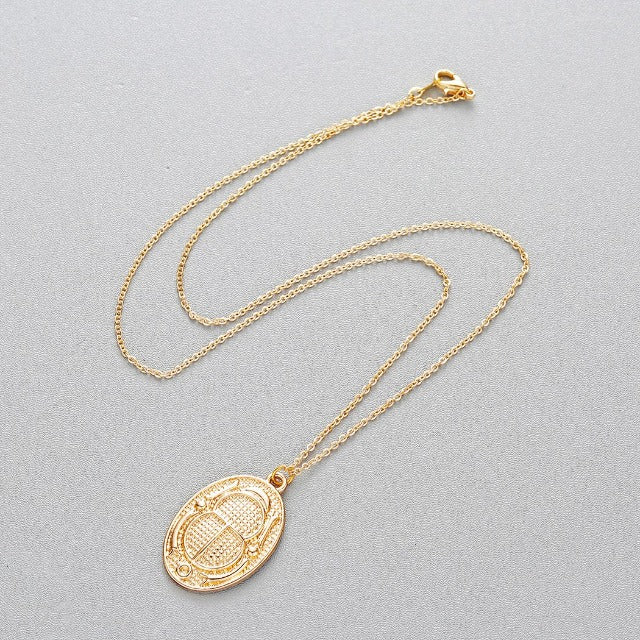 Egyptiläinen Scarabee-kaulakoru kulta